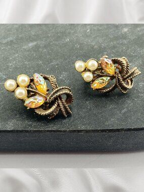 VINTAGE Gold tone metal, faux pearl, and golden yellow plastic clip-on earrings